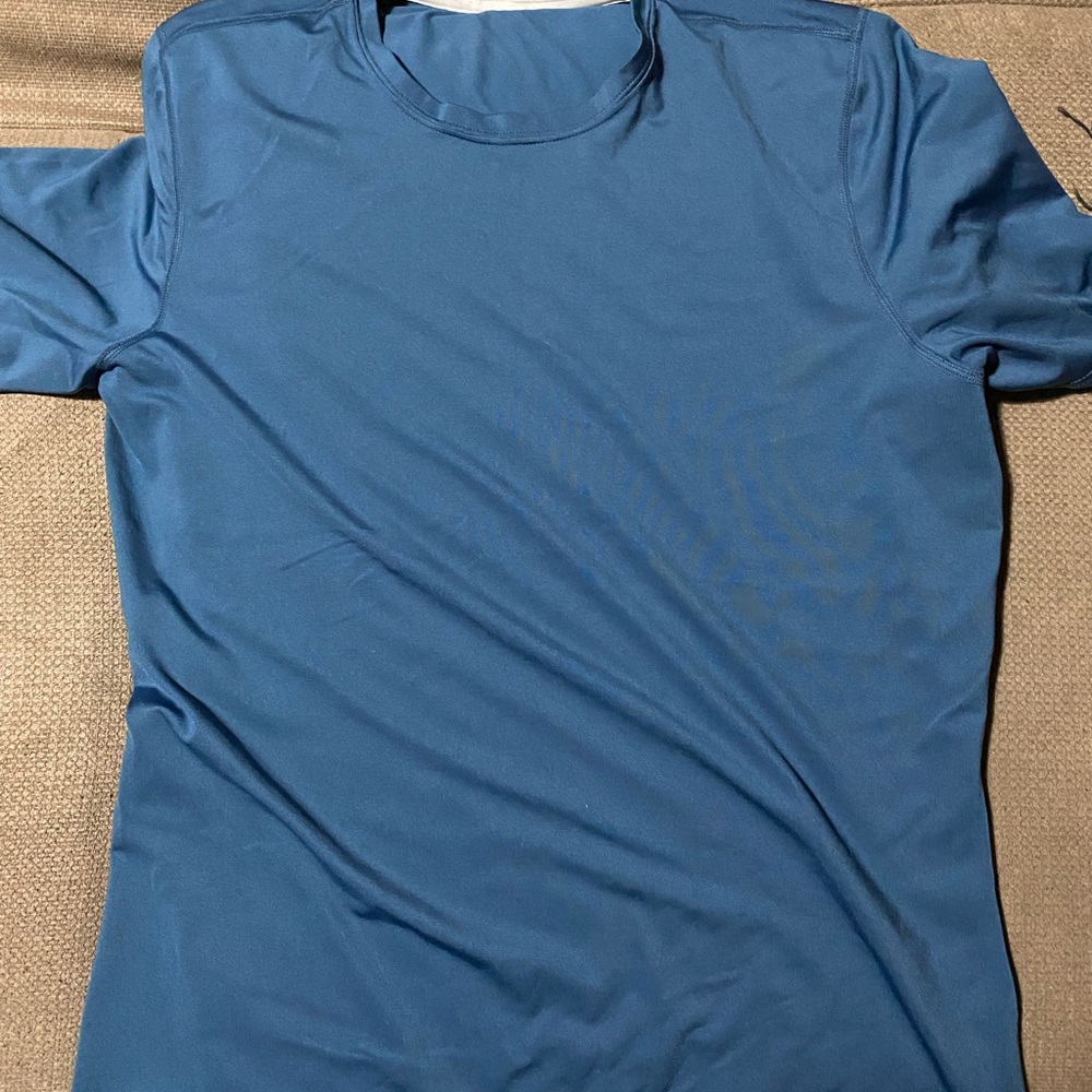Patagonia tshirt, medium blue, polyester, size medium/large